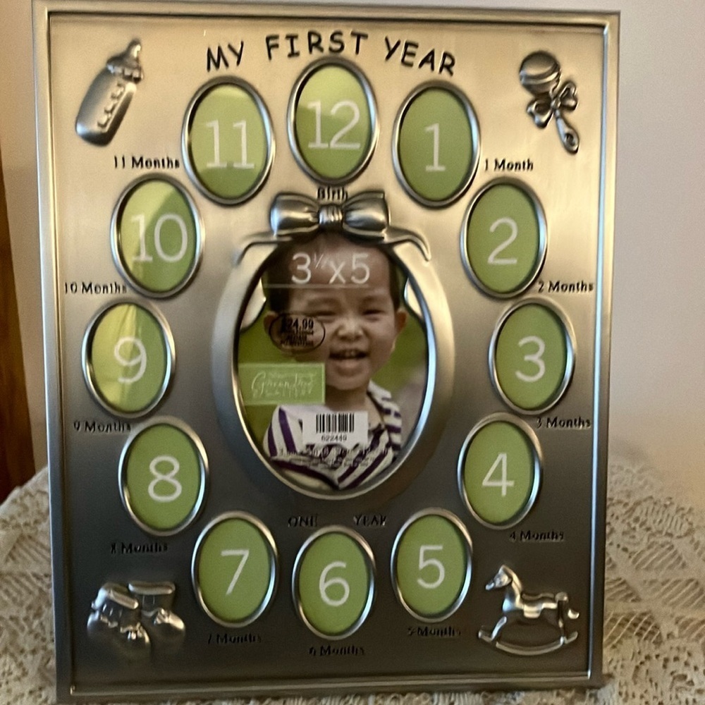 Baby’s First Year Photo Frame- Silver Finish 1 - 3”x5” 12 1.5”x2” openings New